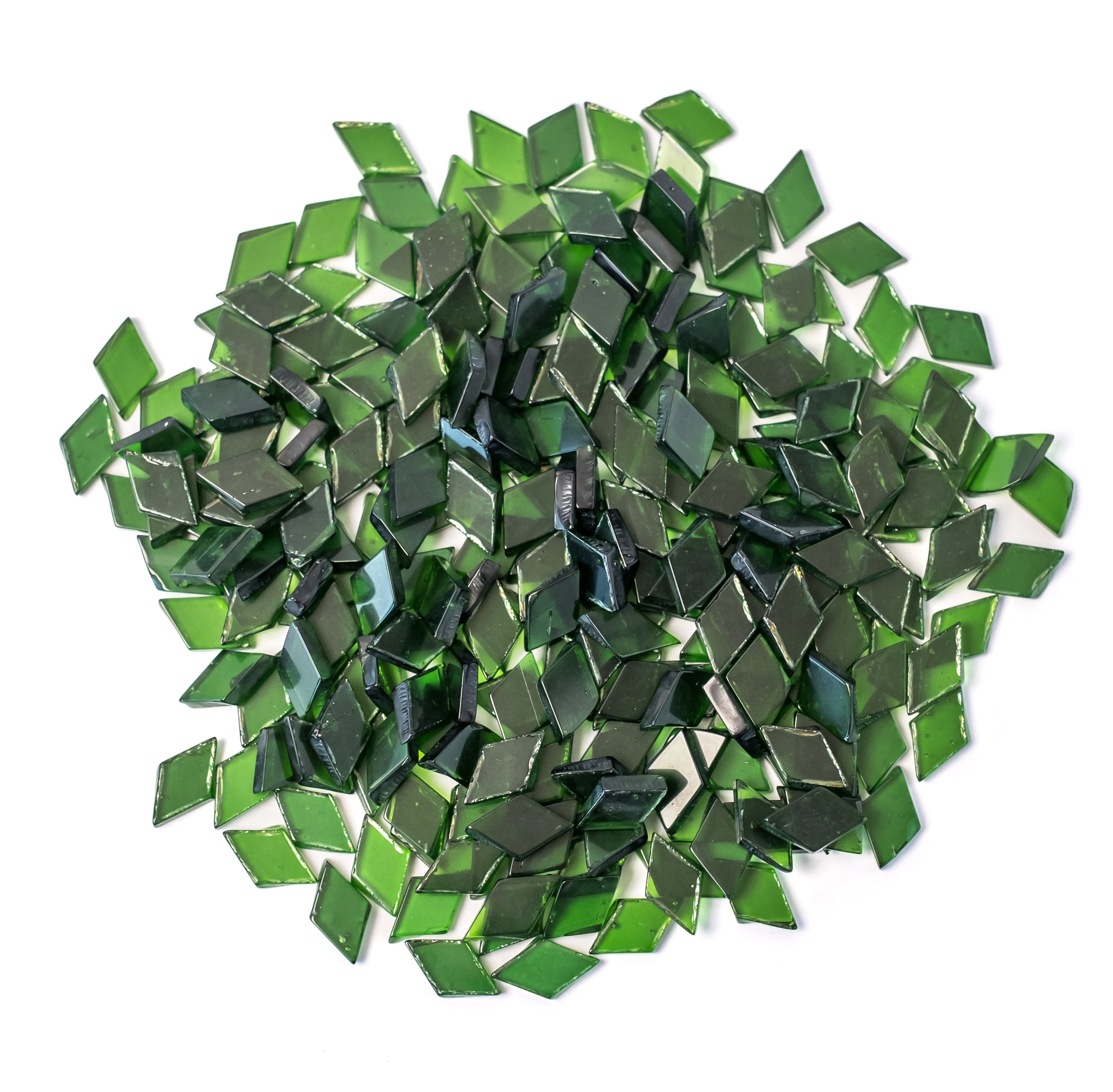Assorted dark green glass mosaic tiles in a variety of diamond shapes.