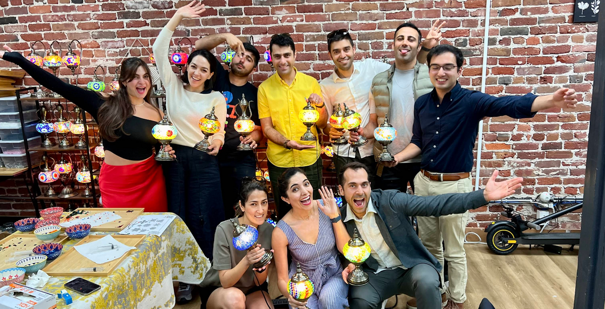 A group of friends creates together during a calm, immersive birthday workshop at KraftStories NYC.