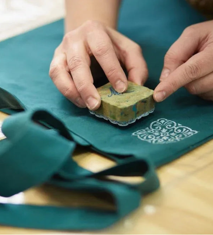 Team building through traditional block printing on fabric and paper.