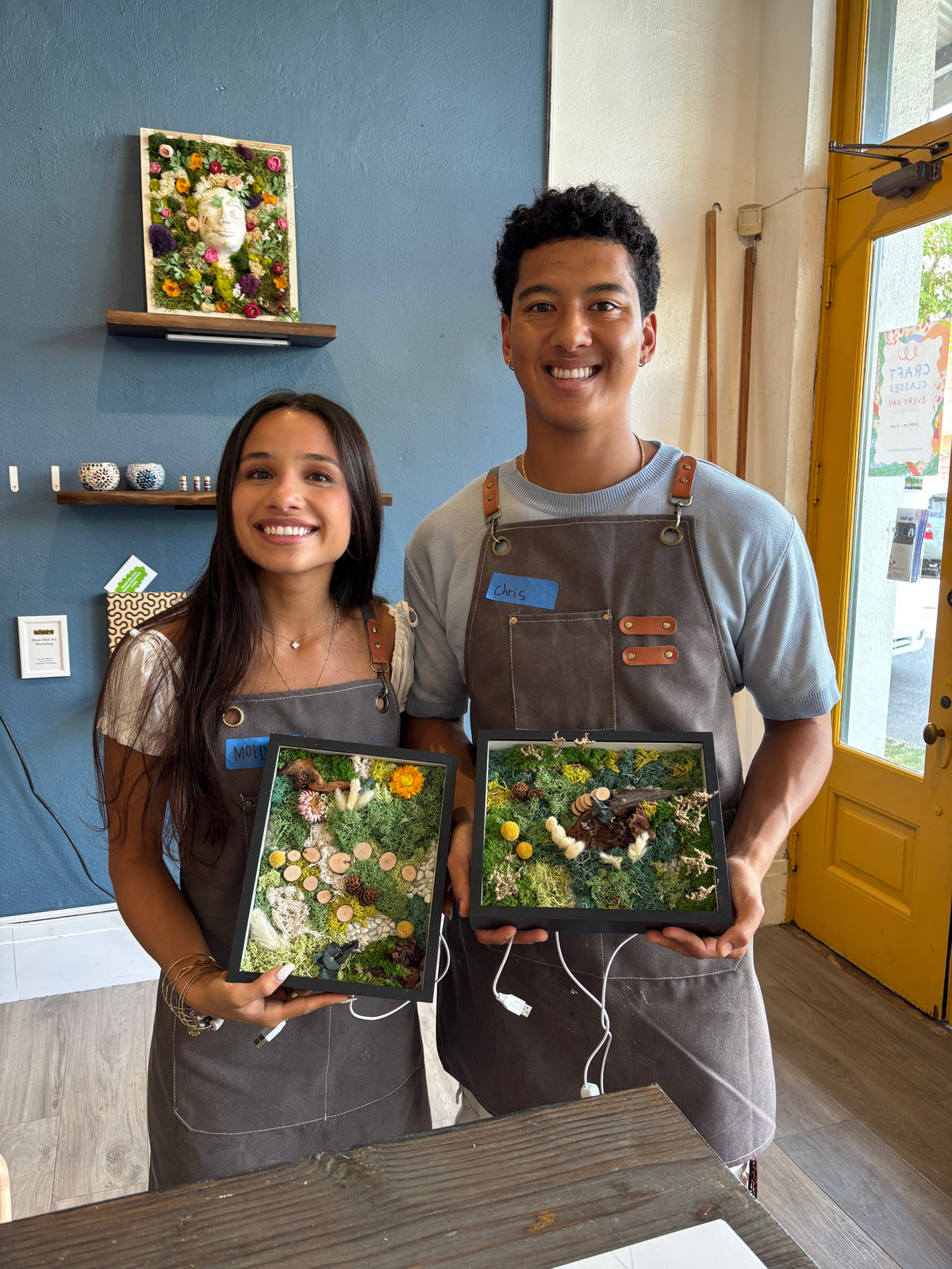 couple joining moss wall art workshop at KraftStories Hawaii