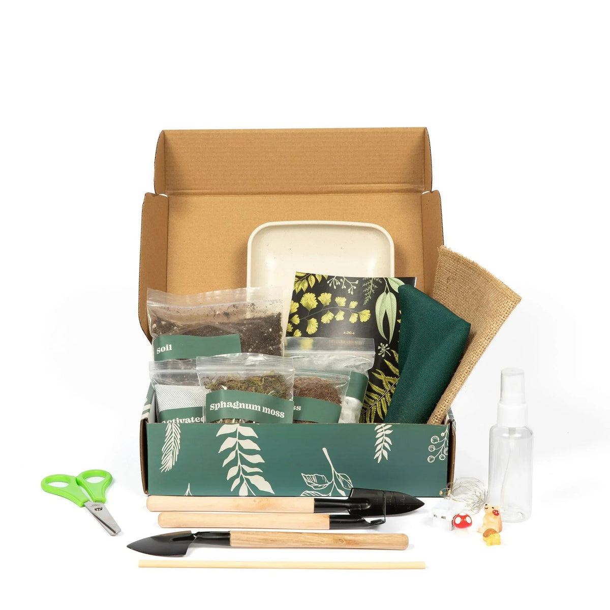 What is inside each closed terrarium kit