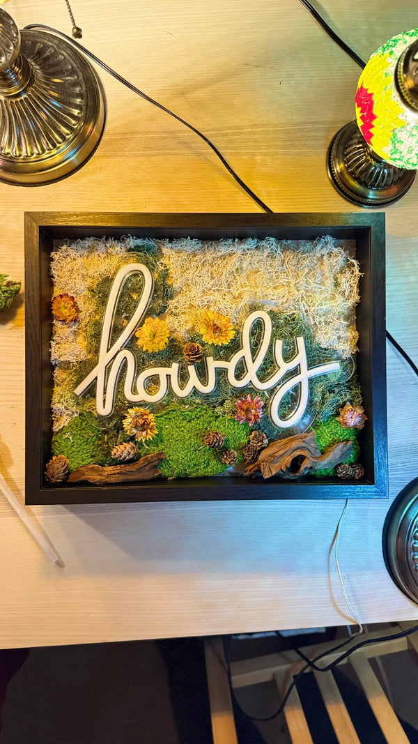 Moss Wall with Neon Sign