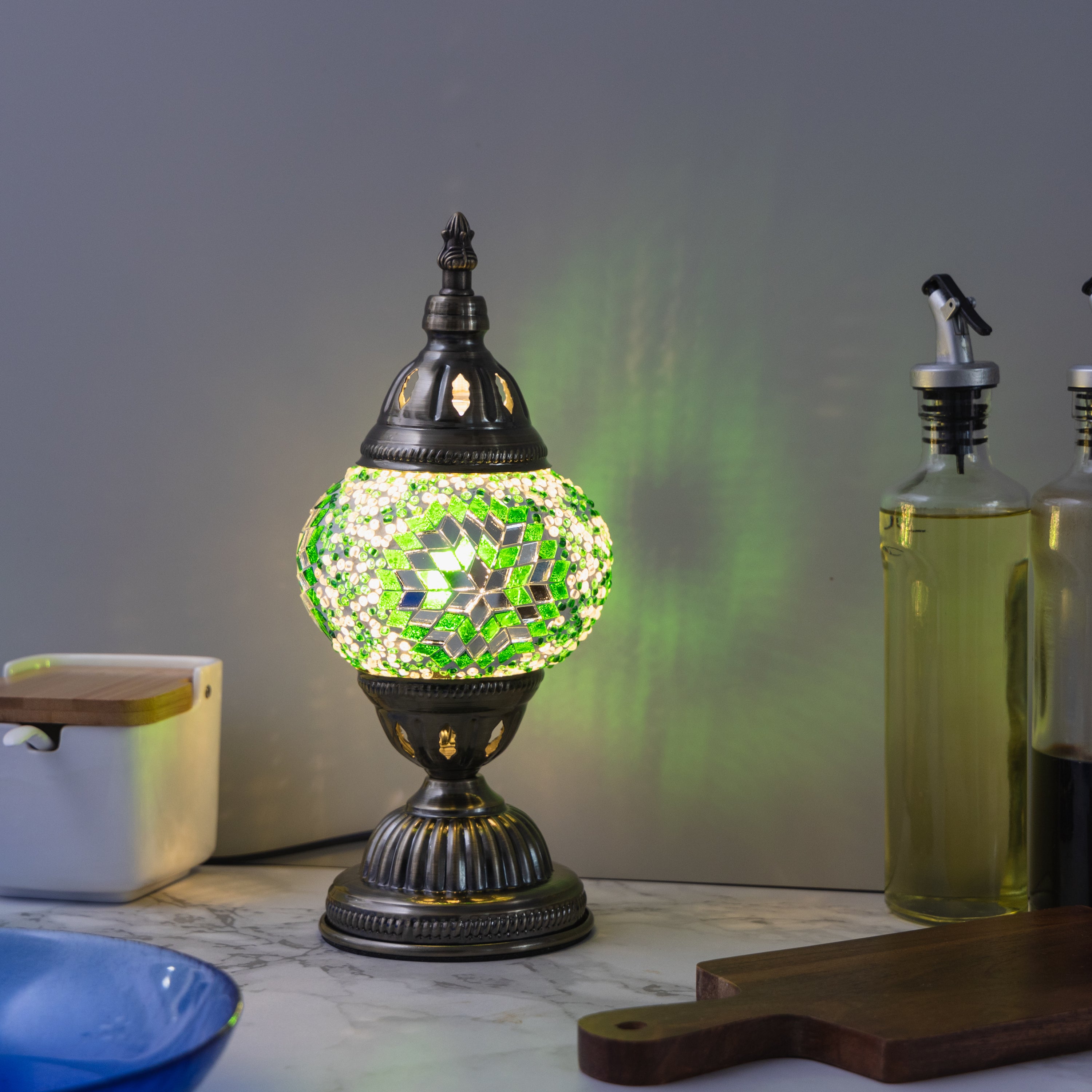 Mosaic lamp with intricate Turkish-inspired design, showcasing a vibrant, colorful glass globe and traditional decorative elements.