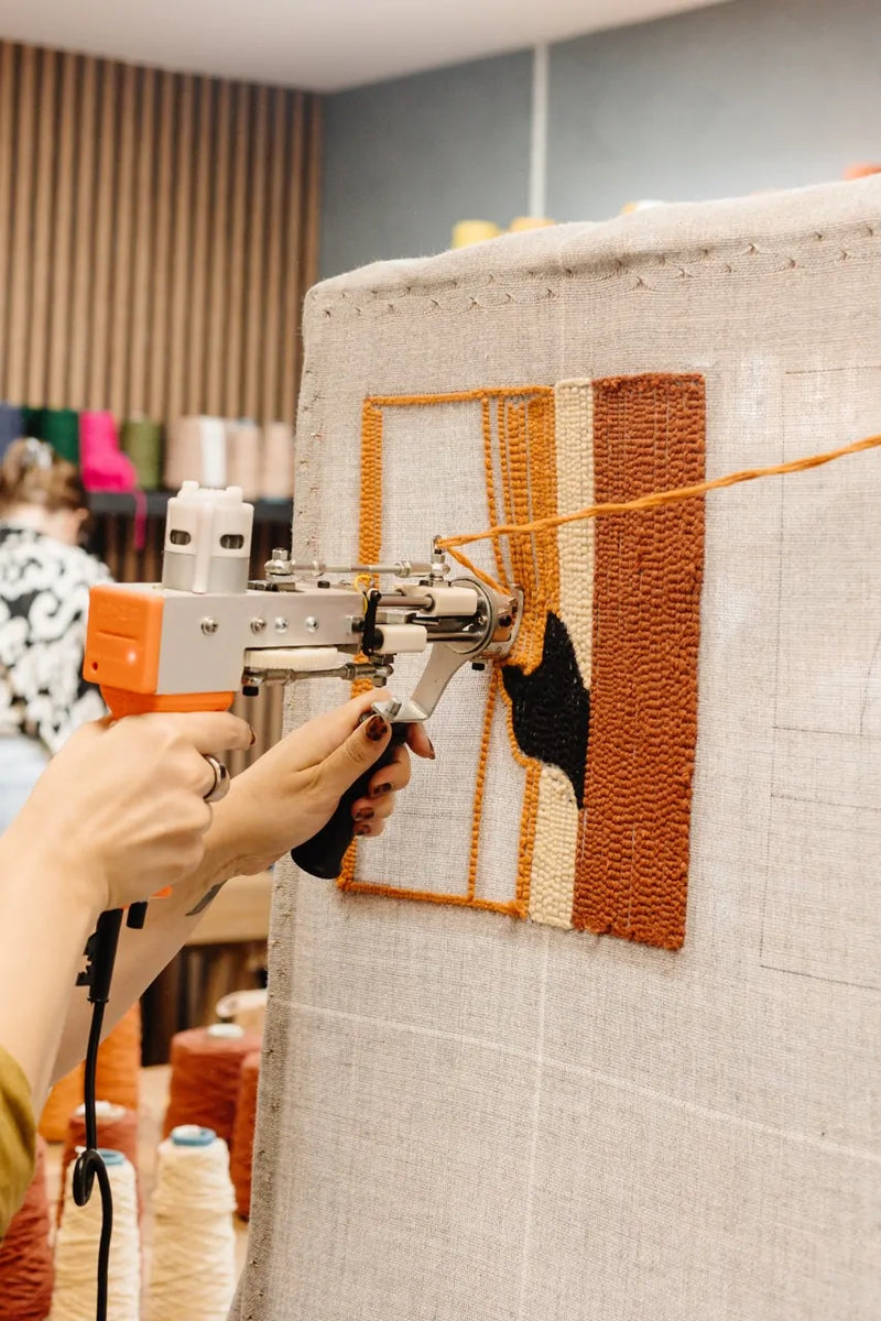 Rhythmic motion of tufting needle.