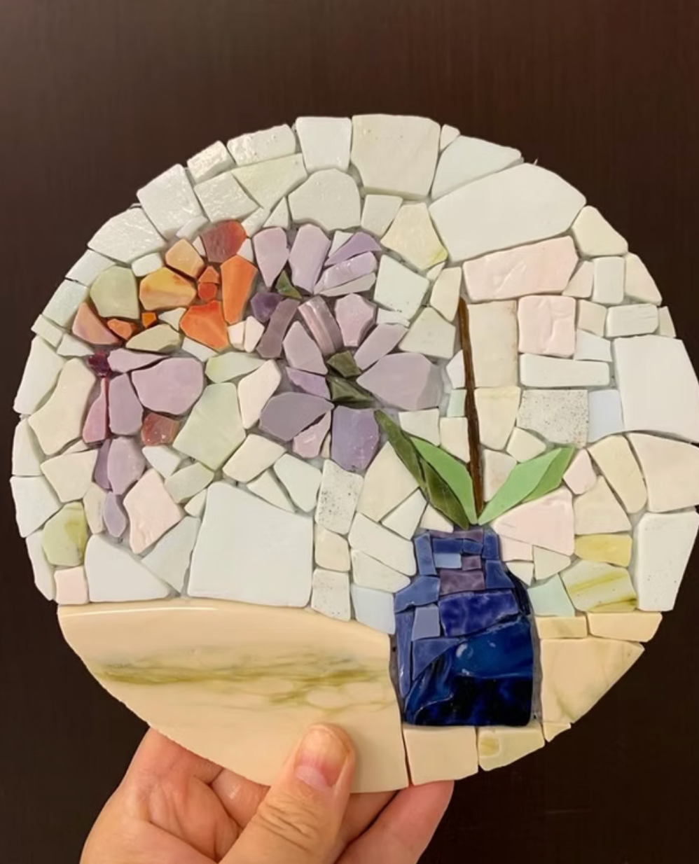 Finished glass mosaic artwork catching the light