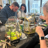 happy people making terrarium in nyc