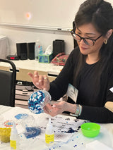 Woman making a turkish mosaic lamp