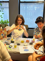 A participant making a turkish mosaic lamp