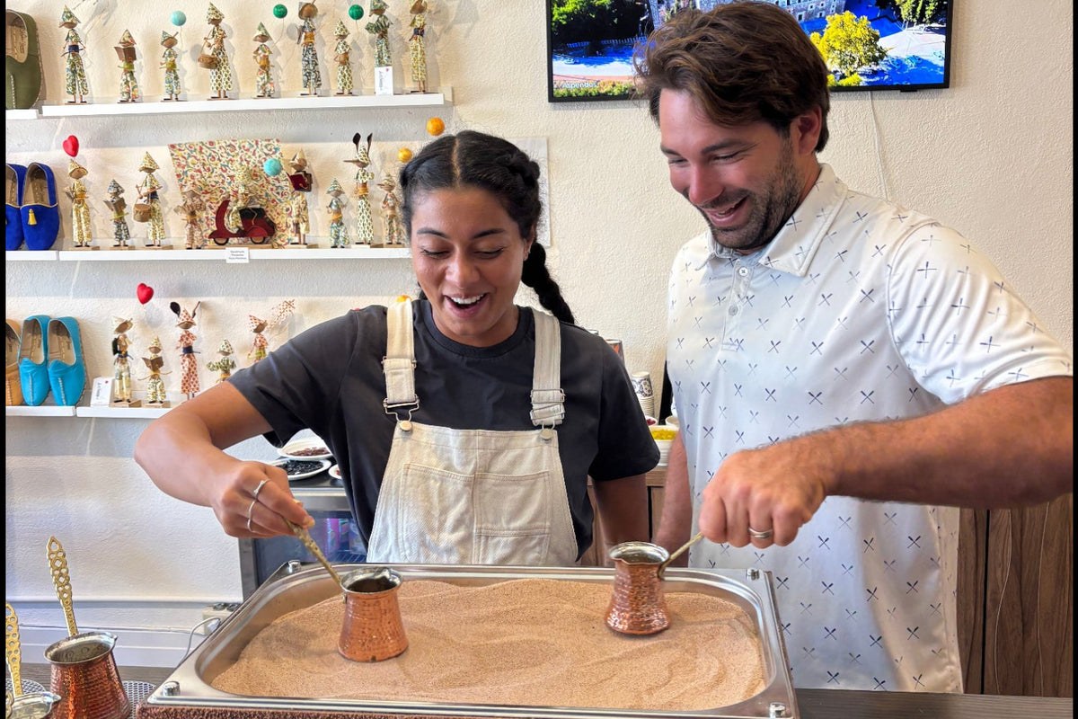 Couple making turkish coffee during their date at KraftStories Hawaii