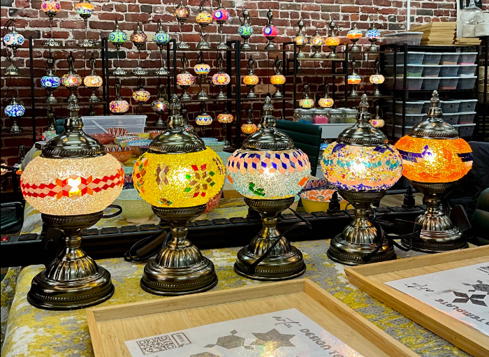 Five glowing handmade mosaic lamps