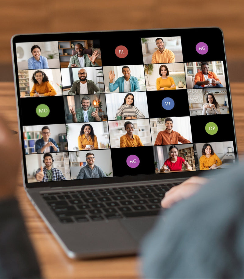 A hybrid workshop session coordinates both remote and in-person participants in a unified creative experience.