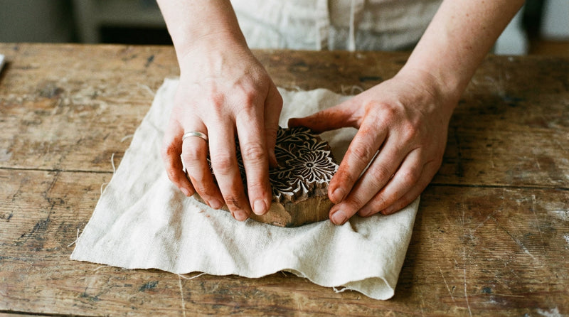 pressing block print in fabric
