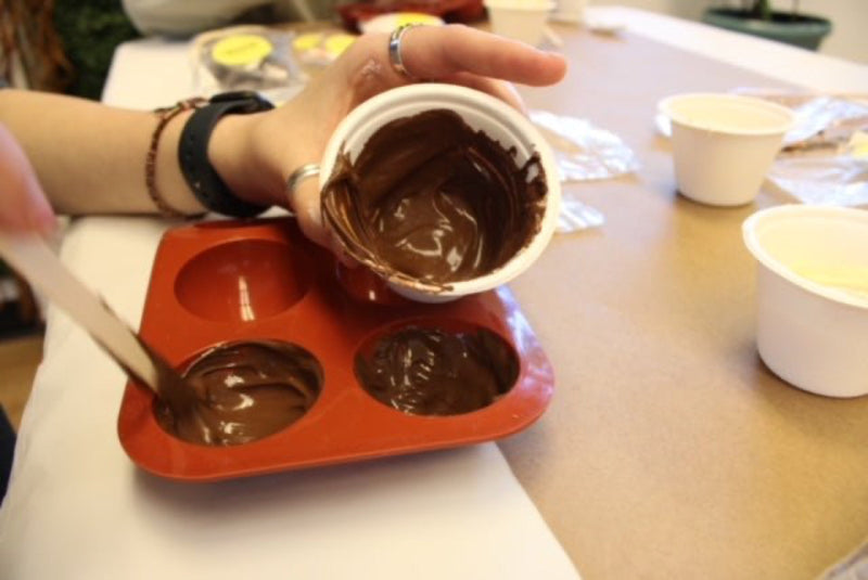 Coat the moulds