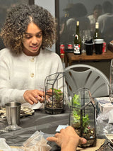 happy woman making terrarium