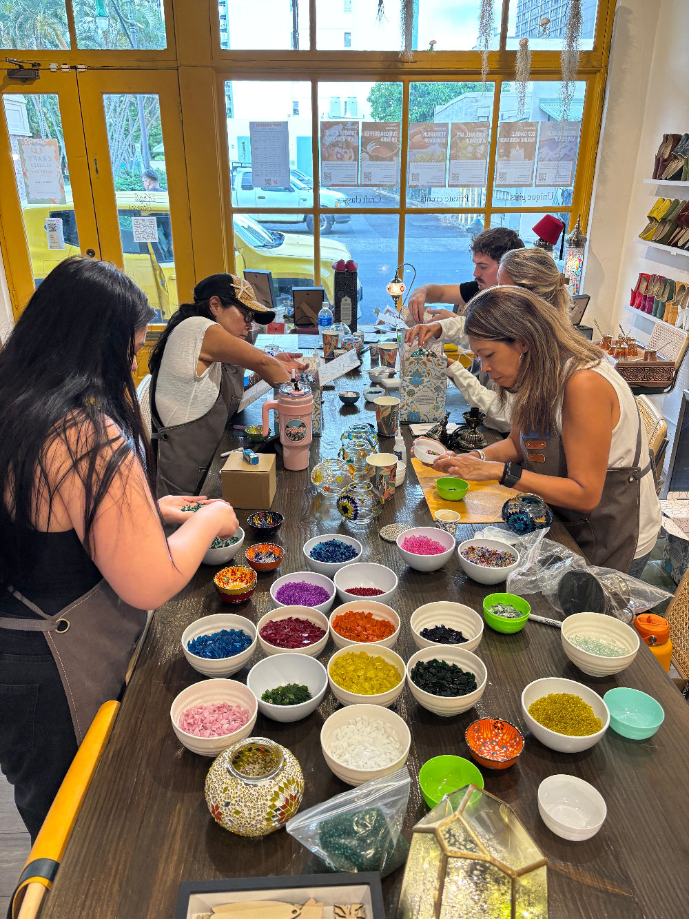 team bonding group, crafting mosaic candle holders at KraftStories Hawaii in Honolulu